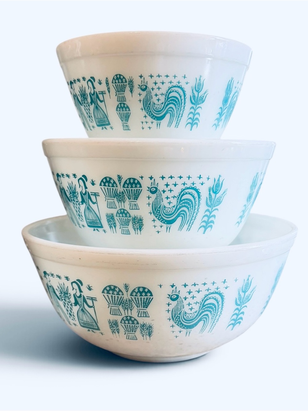 White Ceramic Nesting Bowls with Teal Folk Rooster Pattern